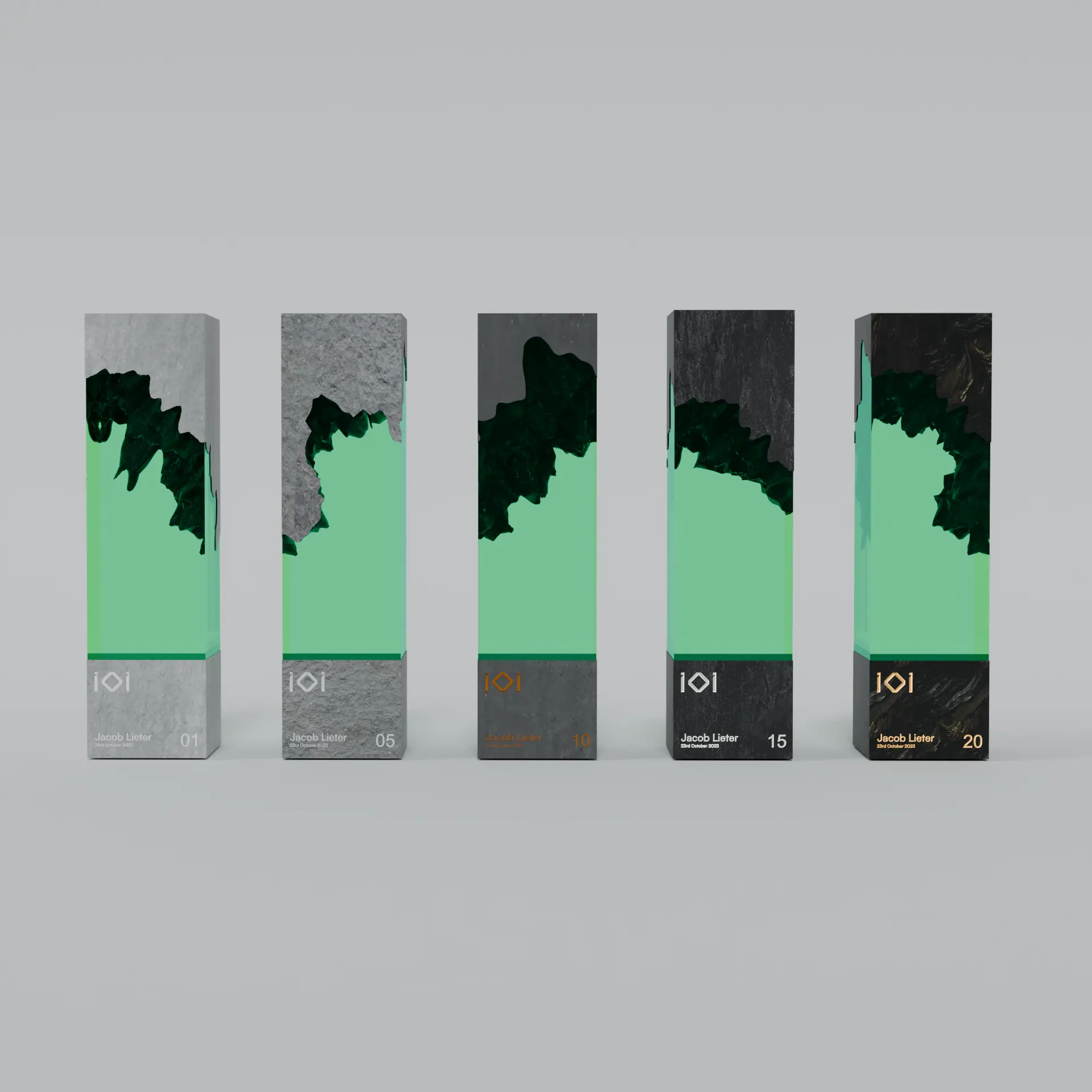 Five slate and green glass award trophies lined up, each engraved with a different year number